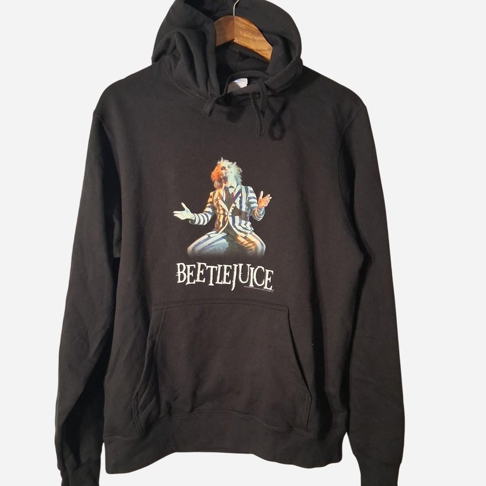 Black Beetlejuice hoodie with graphic of Beetlejuice in a striped suit